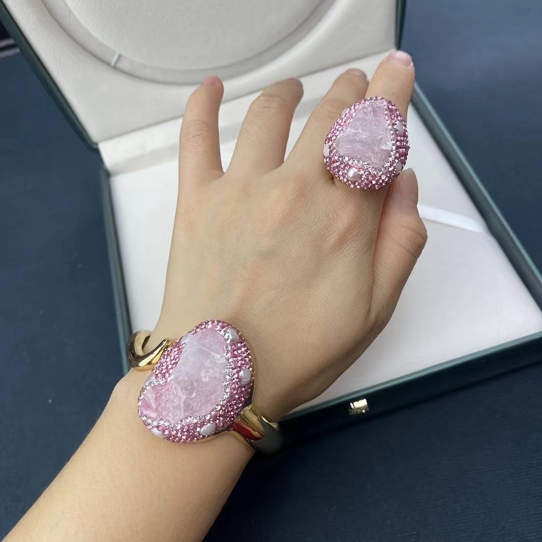 A set of handcrafted jewelry for women featuring bohemian style natural pink quartz bracelet and ring, plated with 14K gold and accented with rhinestones. Made from titanium alloy, this fashion jewelry is perfect for daily wear.