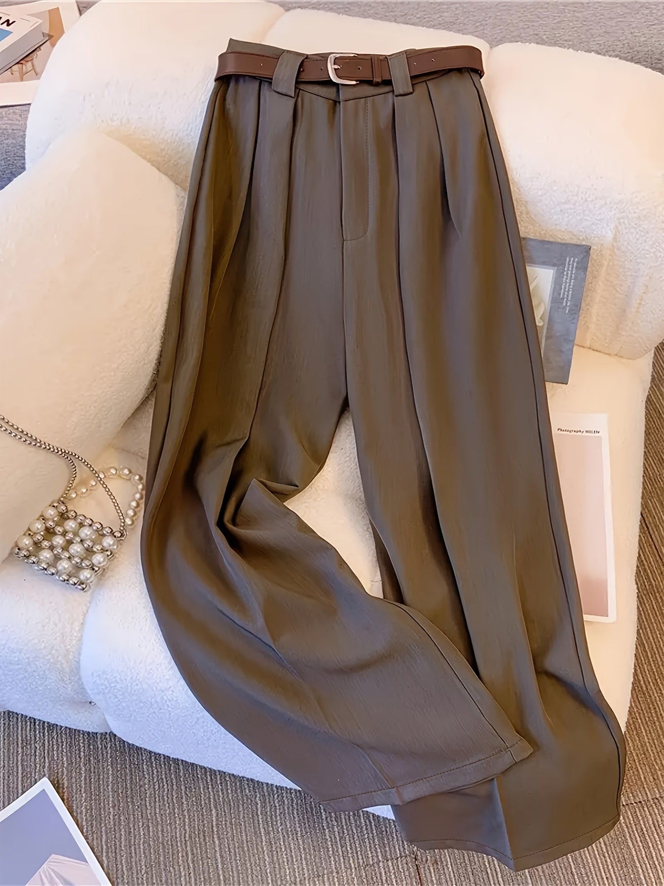 Stylish, high-waist wide-leg pants for women with zipper closure, solid color, made of polyester, machine washable. Features chic pleated design for versatile wear.