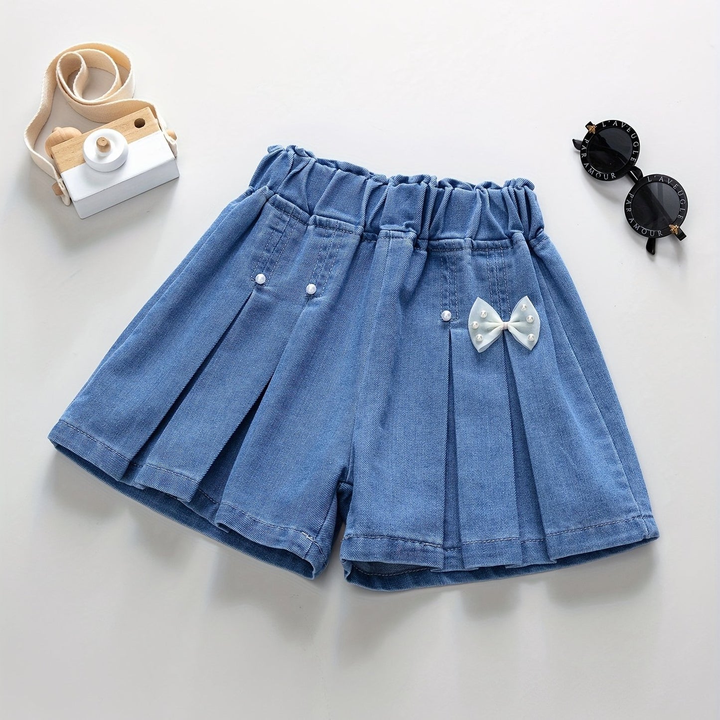 Girls' denim pleated skirt and ruffled shorts for summer, perfect for daily wear or beach holidays with a comfortable and elastic waist.