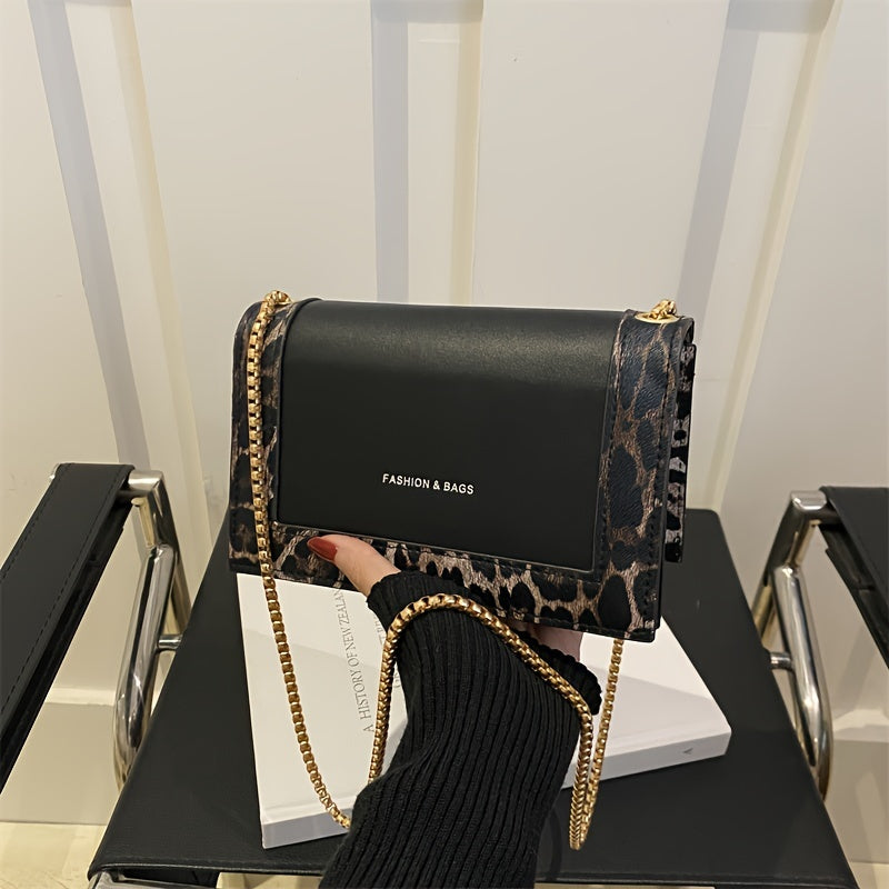 Stylish leopard print crossbody bag for women in black synthetic leather with golden-tone chain strap. Magnetic closure and large capacity, suitable for work, travel, and everyday use.