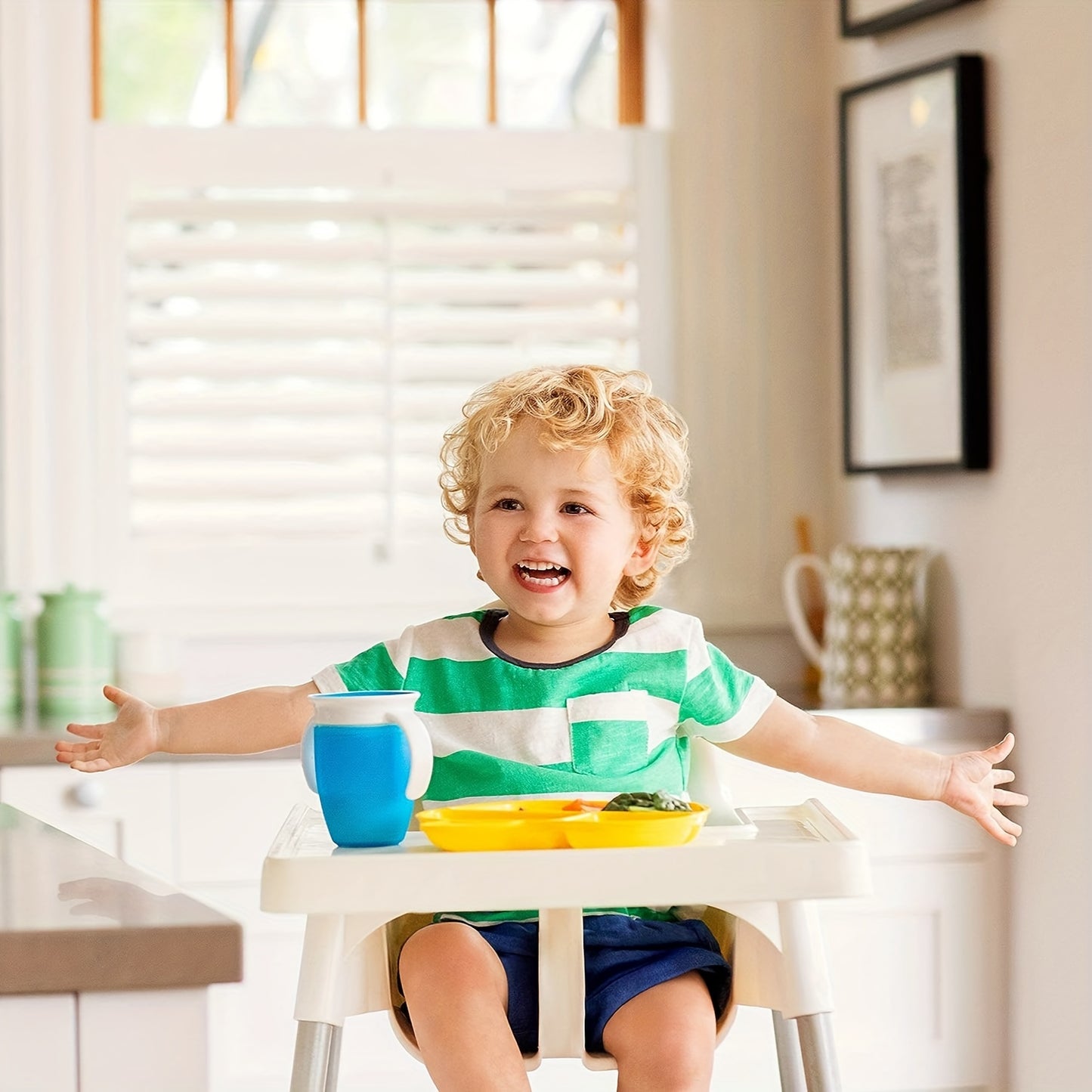 Pink and white leak-proof training cup with easy-grip handles for young children. Made of durable, lightweight silicone and is handwash recommended.