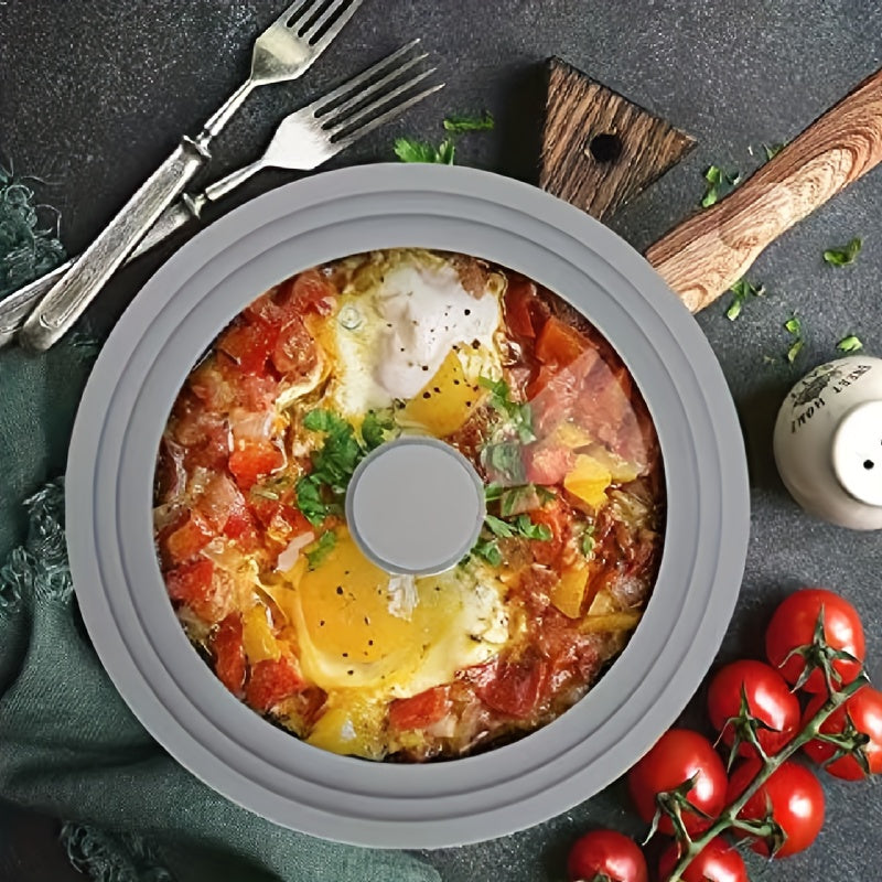 Universal pot cover designed to fit flat pans and frying pans, made of tempered glass with a silicone edge. Compatible with kitchen utensils ranging from 20 to 28 cm/ 7.8in to 11.02in in diameter. Can also be used as a replacement cover and is dishwasher