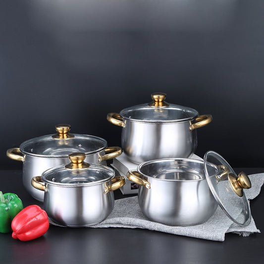 Set of soup pots with double bottom and curved golden handles