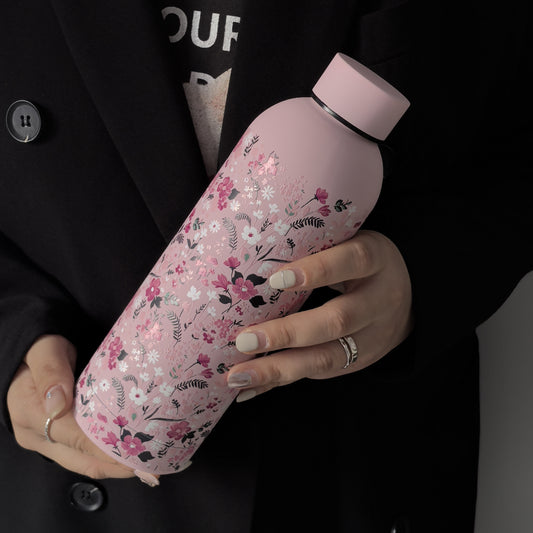 Stylish 16.9oz insulated water bottle with chic pink floral design, perfect for travel, sports, and everyday use. Great gift for birthdays and holidays.