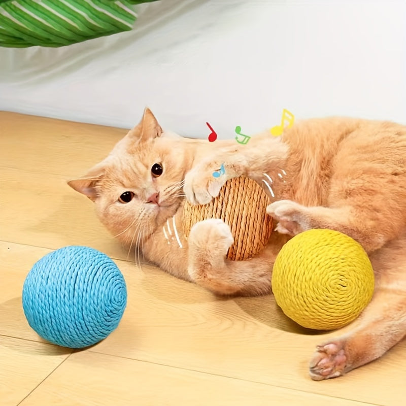 Interactive sound-making cat scratching ball toy made of cardboard material for cats to relieve play with their pet companion.