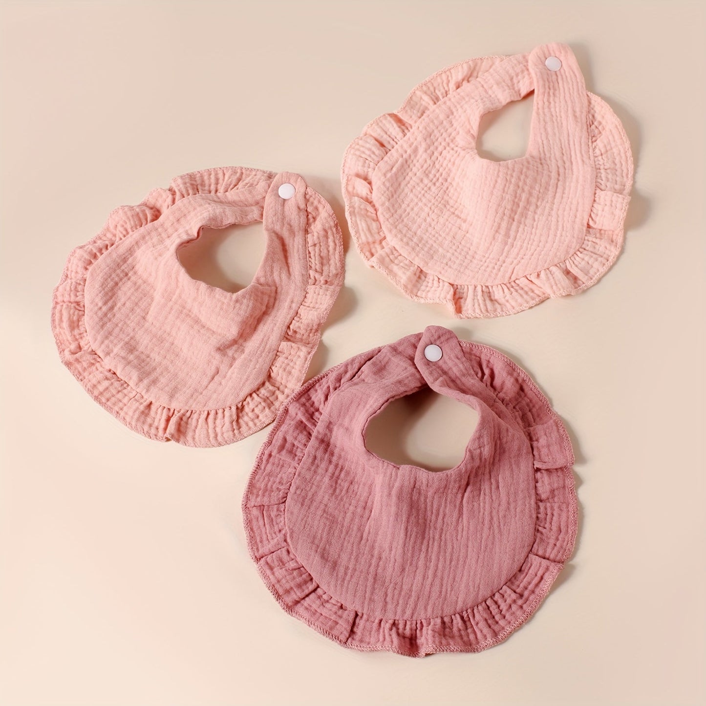 Eight pieces of 2-layer soft bibs with wrinkle-resistant and breathable fabric, ideal for feeding and keeping baby clean. These adorable cotton ruffle bibs are perfect for catching saliva and spills.