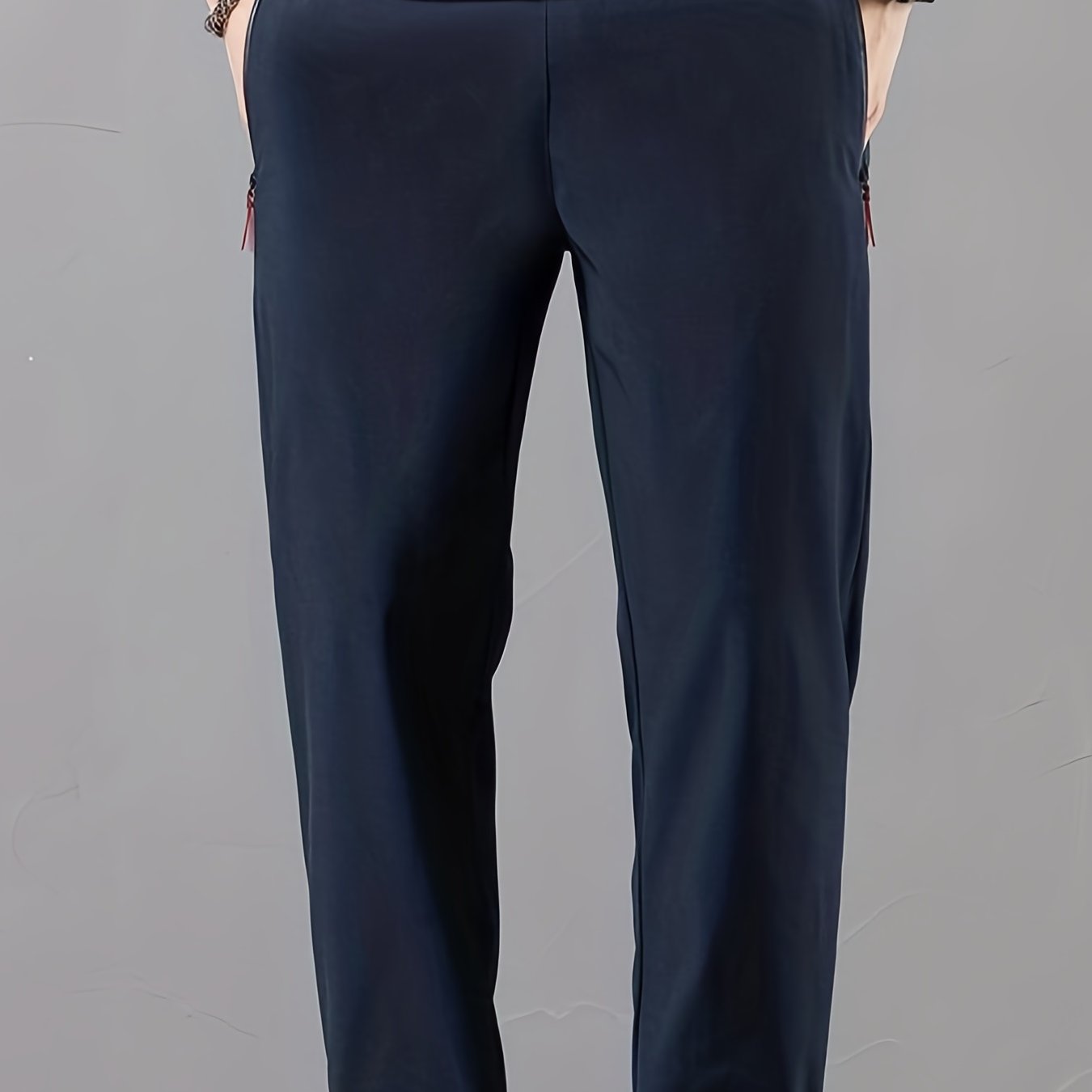 Casual men's pants with stretch, drawstring and zipper for spring and summer sports.