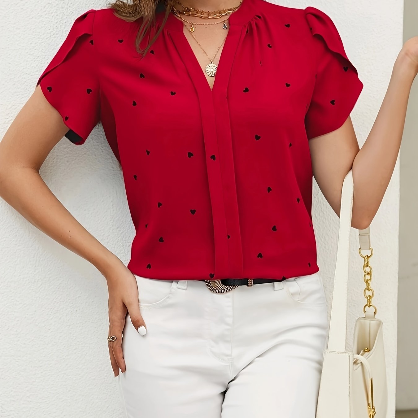 Light blue heart pattern V-neck blouse for women in casual polyester/spandex, available in petite sizes, machine washable, everyday fashion with smooth texture.