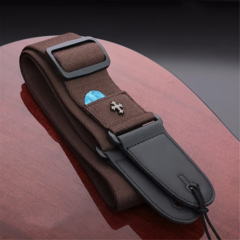 Vintage electric guitar strap with cross design and pick pocket, suitable for acoustic, folk, bass, and ukulele.