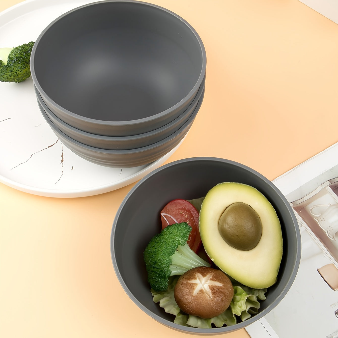 Durable plastic bowls safe for microwave use, perfect for meals at home or on-the-go. Offered in sets of 2, 4, or 6.