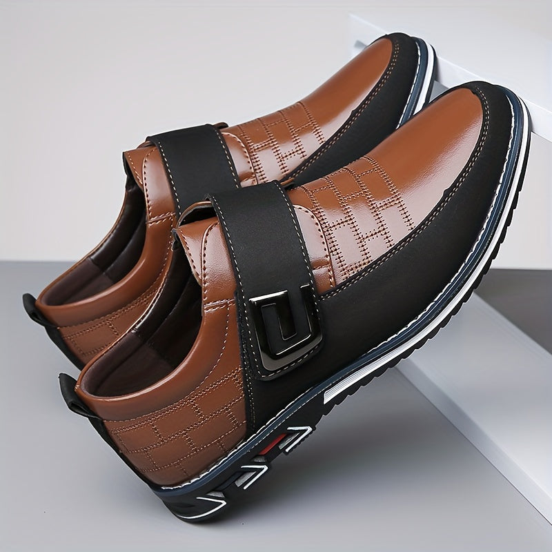 Men's dress loafers with hook and loop fastener for business or casual wear.