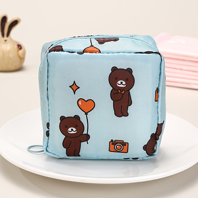 Polyester organizer bag for girls with cartoon design, ideal for storing sanitary napkins. Large capacity and portable. Great for home organization.