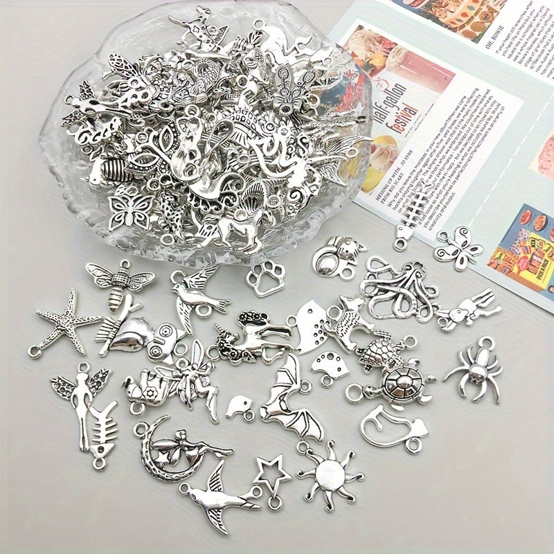 100 pieces of metal mixed jewelry making charms, vintage animal charms for DIY necklace making.