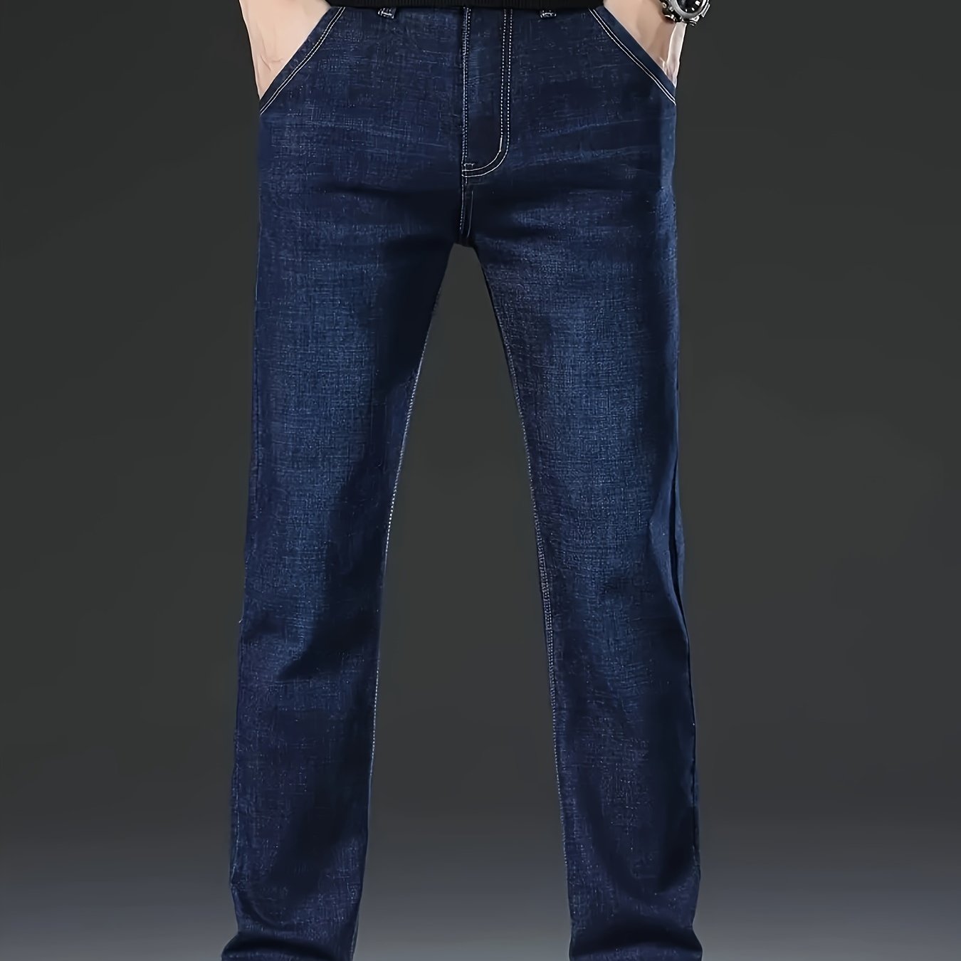 Classic straight-leg jeans for men in a comfortable business-casual style, made from a cotton blend with stretch, and solid washed denim suitable for year-round wear.