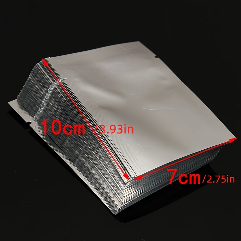 A pack of 100 small pure aluminum vacuum sealer bags in sizes 6x8cm, 7x10cm, and 8x12cm. These aluminum foil food storage pouches are made of PET material and do not require electricity.