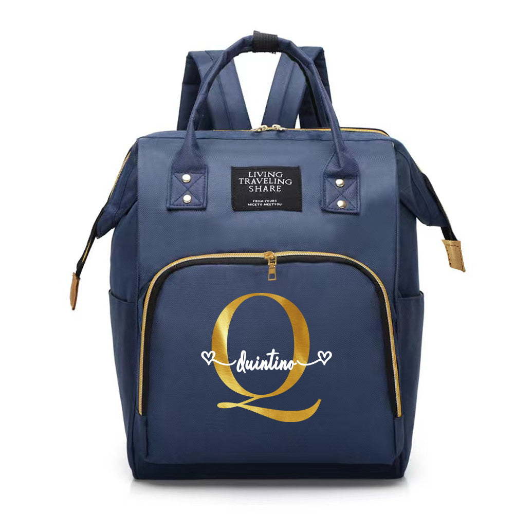 Customize your Oxford cloth diaper bag with your own initial, featuring a large capacity and soft shell. This mommy backpack is perfect for casual travel and comes with a convenient bottle nursing storage organizer for women.