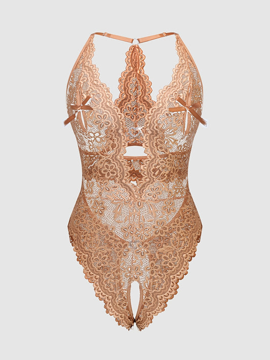 Heart-shaped deep V lace bodysuit with open crotch and sheer back, made from nylon and elastane blend.