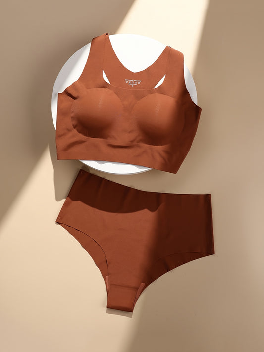 Set of seamless racerback wireless bra and matching elastic panties for women, lingerie set.