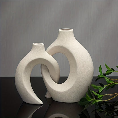 Set of 2 white ceramic vases in Nordic Boho style for elegant home decor, suitable for various rooms and occasions.