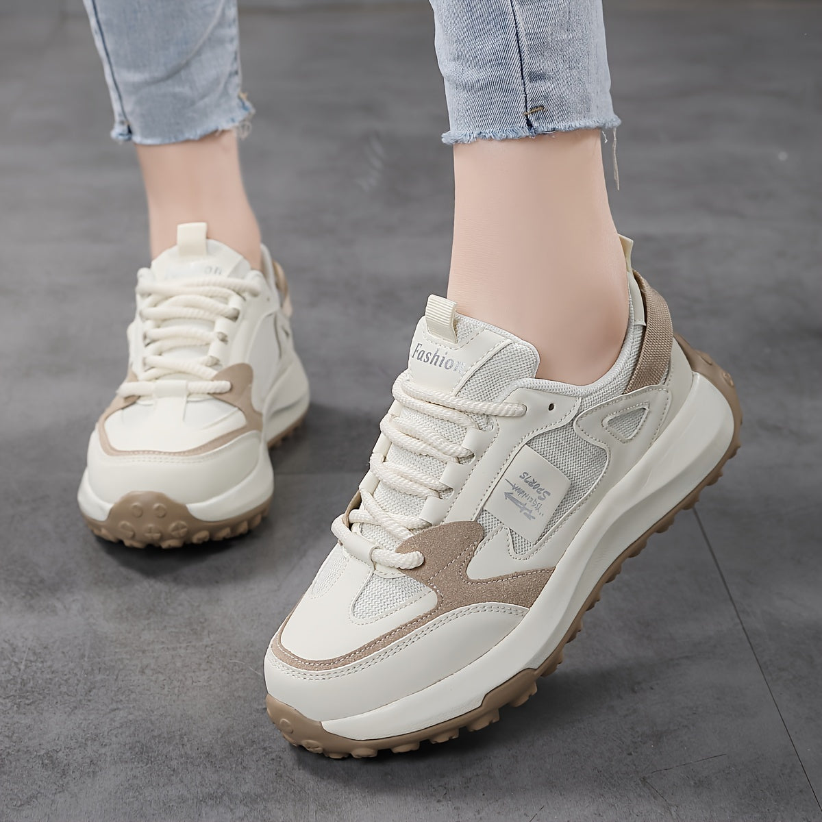 Beige mesh women's casual running shoes with stable support, non-slip sole, and breathable design suitable for outdoor sports.