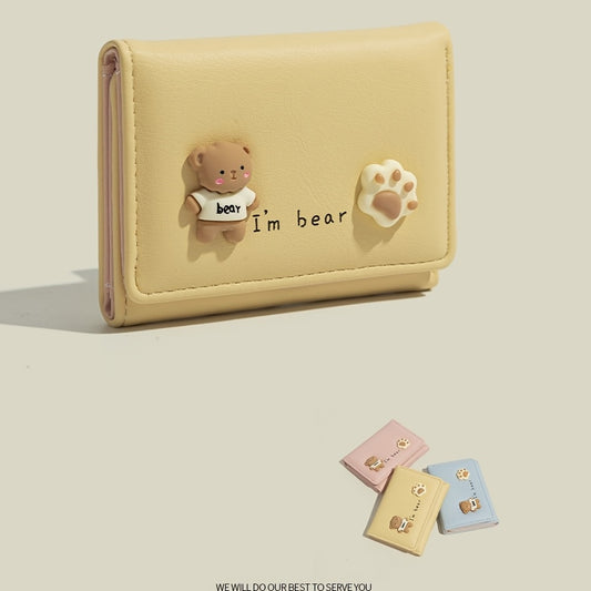 Chic compact folding wallet for women with cute cartoon design and slim faux leather card holder.