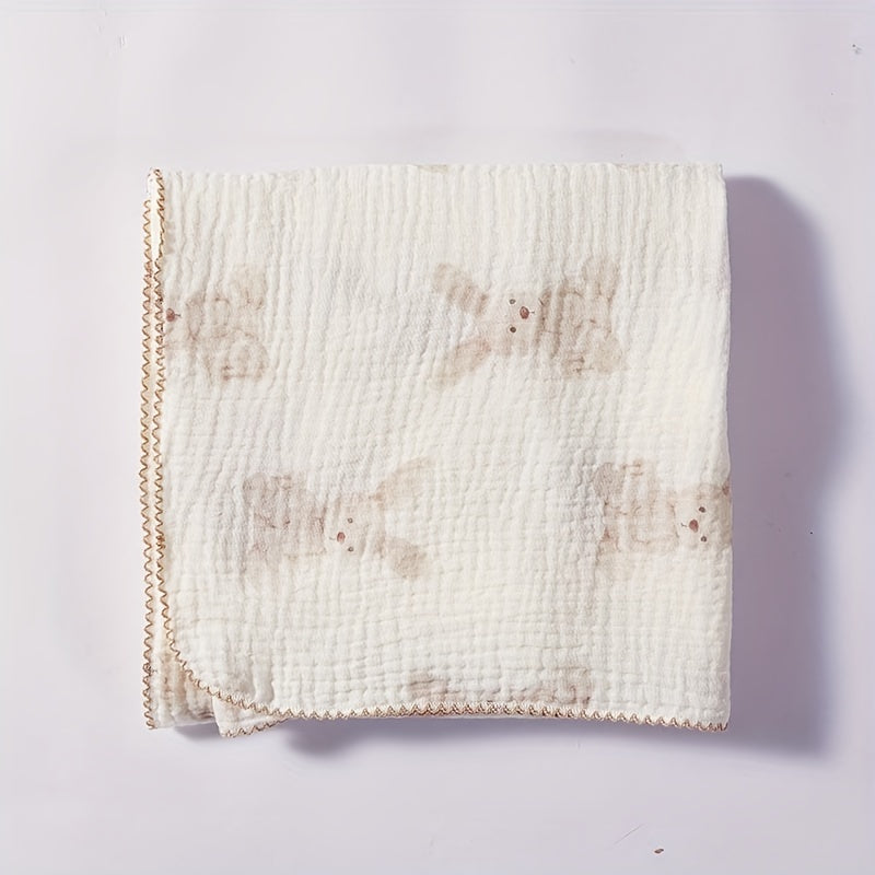 Soft and delicate baby bath towel adorned with lace trim and adorable cartoon print.