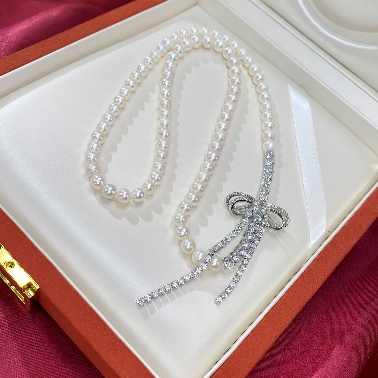 Chic Pearl Necklace adorned with Sparkling Cubic Zirconia Bow - Ideal for Weddings, Mother's Day, and Special Events