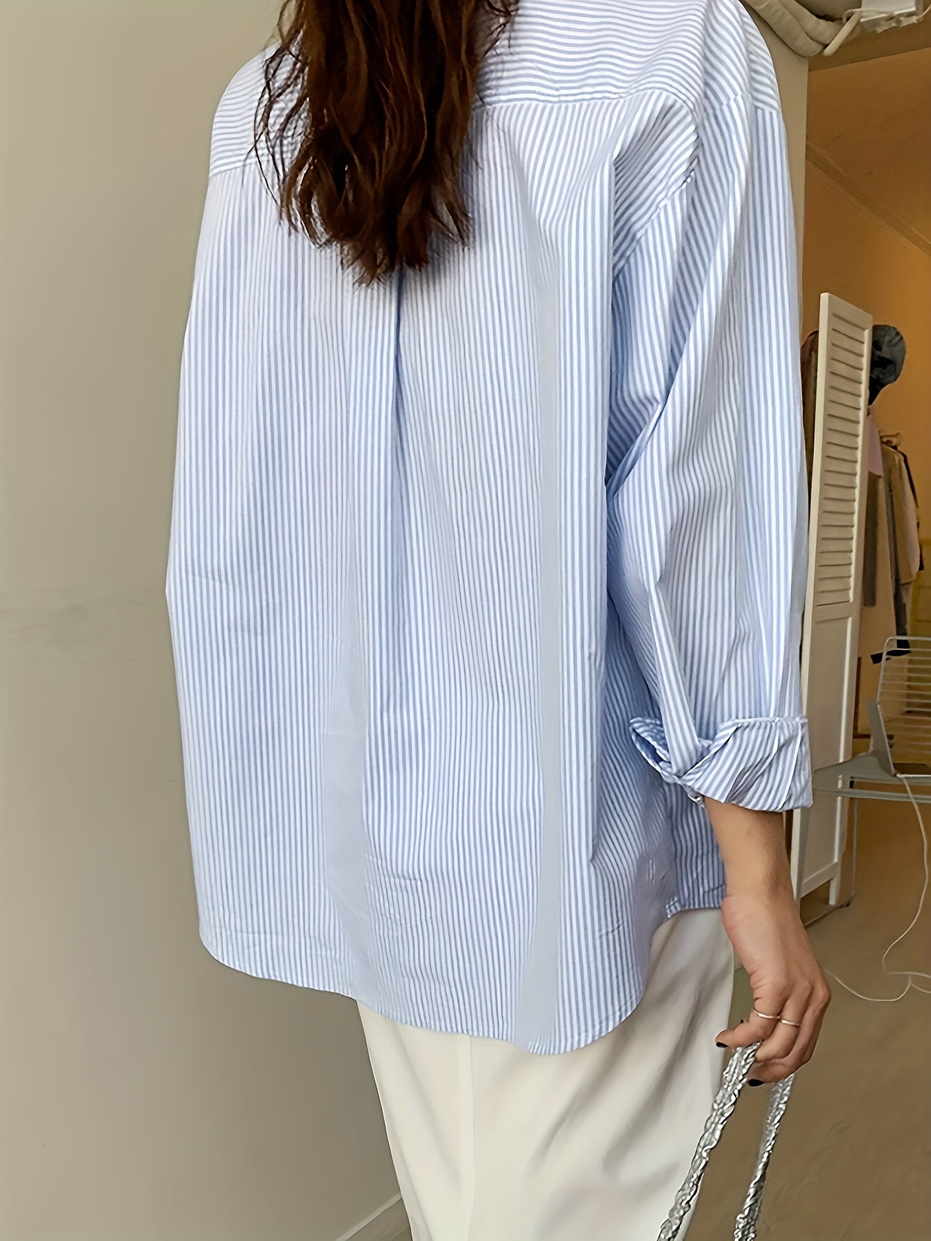 Stylish blue striped long sleeve shirt for women, perfect for commuting, made of polyester and machine washable.