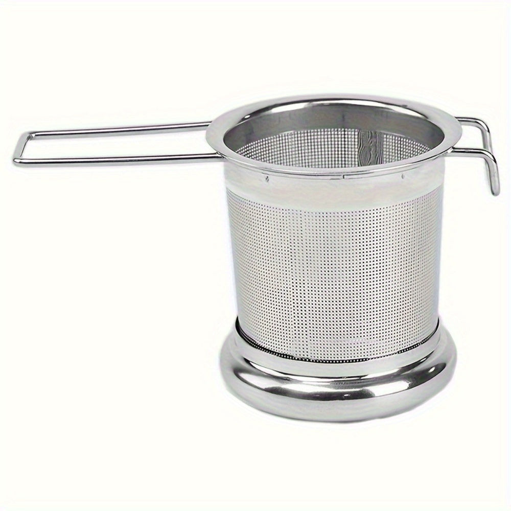 Tea infuser made of durable stainless steel for loose leaf tea, with lid and handle for convenient use at home, office, restaurant, or hotel. Features micropore metal strainer basket.