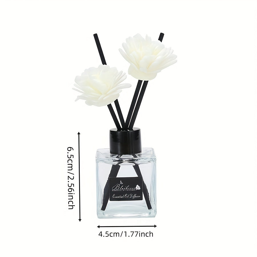 Elegant white floral diffuser with black sticks, versatile air freshener for bathroom, bedroom, car, and outdoor use. 1L capacity, glass container, indoor aesthetic.