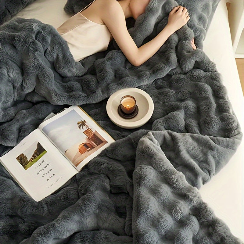 Get cozy with this versatile 1pc Double-sided Rabbit Fleece Blanket. Made with soft faux fur plush material, this solid color blanket is perfect for keeping warm on the couch, sofa, office, bed, camping, or travel. It also makes a great multi-purpose