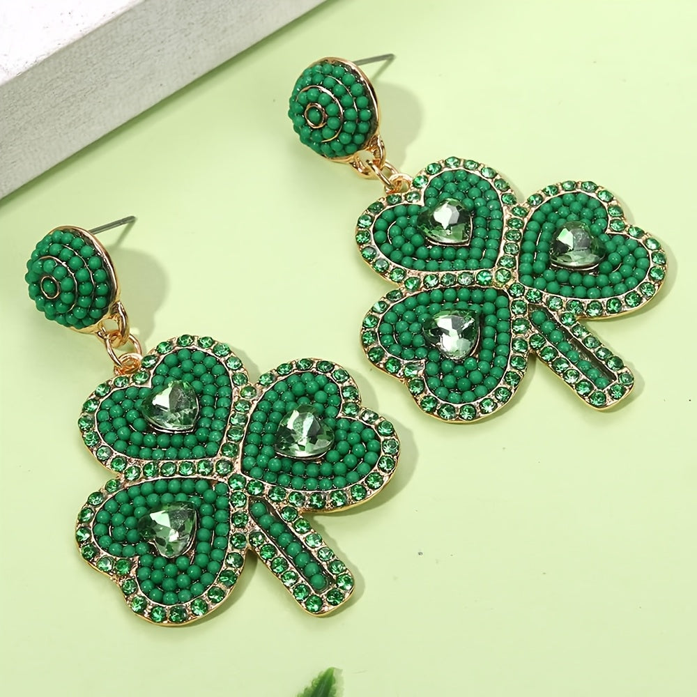 Celebrate St. Patrick's Day in style with these stunning Green Clover earrings adorned with handcrafted beaded rhinestones. Perfect for an Irish festival, this unique jewelry gift for women is made from high-quality Zinc Alloy and Stainless Steel in a