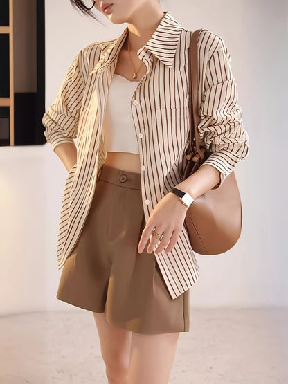 Elegant striped button-up shirt for women with a French-inspired design in beige and brown vertical stripes for spring/summer.