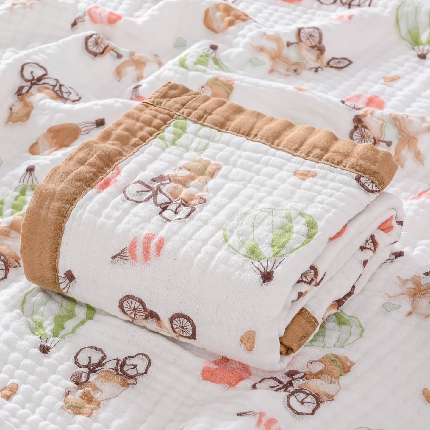 This multipurpose contemporary throw blanket is made of 6 layers of thick cotton gauze with a cute cartoon pattern. It is hypoallergenic and stain-resistant, making it perfect for use in the bath, for napping, on the bed, or in the office. Please hand