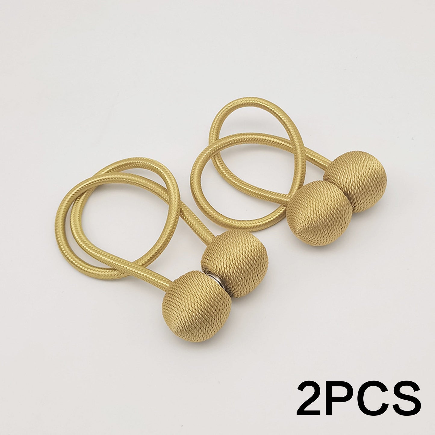 Get your hands on a set of two Classic Style Magnetic Curtain Tiebacks. These tiebacks are designed to be durable and easy to install without any drilling required. Made from polyester twisted rope, they feature a strong magnetic hold to secure your