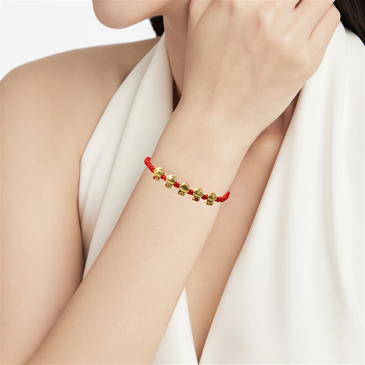 Incorporating a Chinese style and adorned with red thread jewelry, the 2025 Lucky Snake Symbol Red Thread Woven Bracelet showcases five snake pendants, creating a one-of-a-kind piece. Perfect for gifts on birthdays, Valentine's Day, Mother's Day, or as a