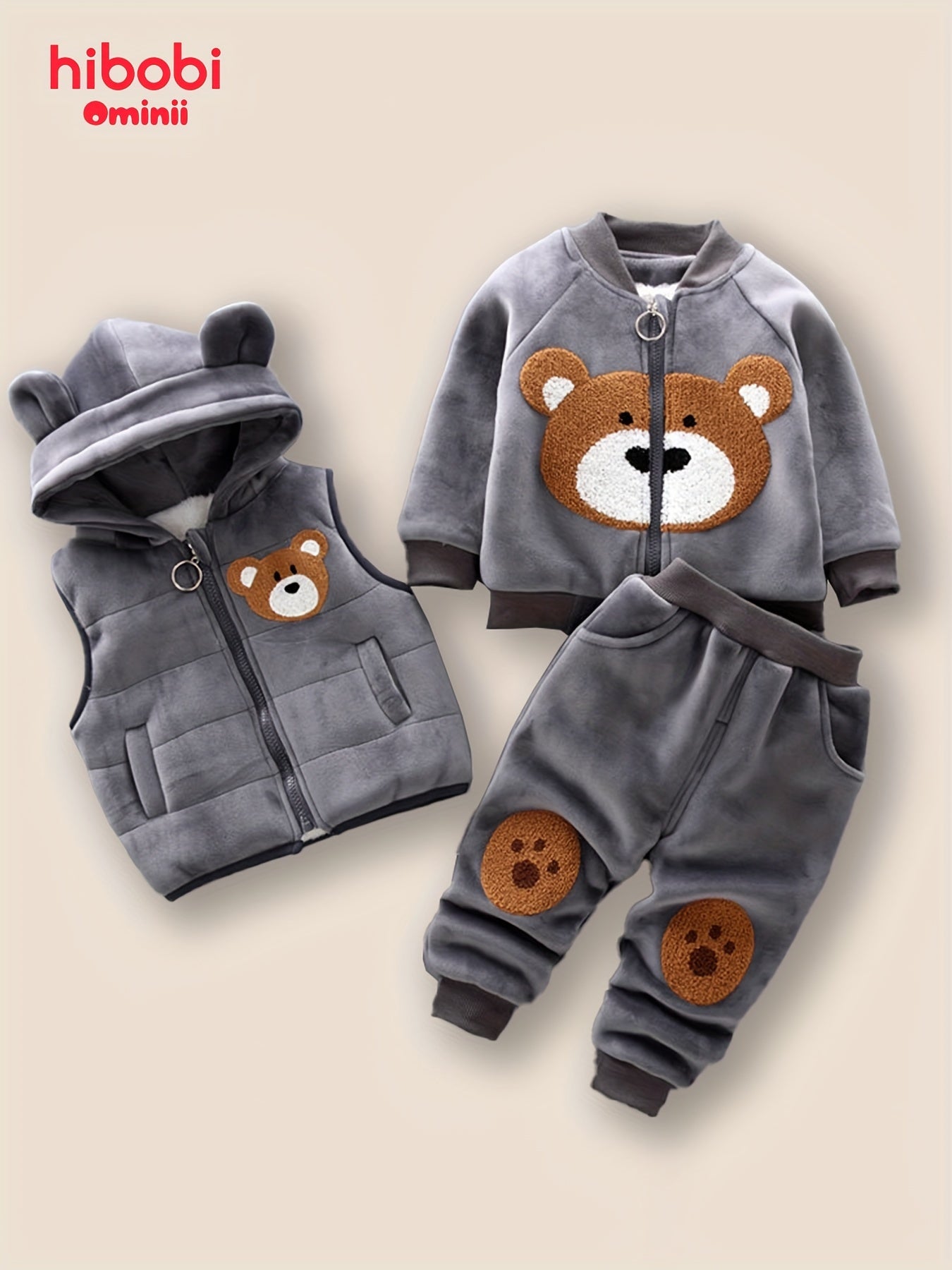 HIBOBI 3 piece toddler boy outfit set with bear appliqué top, hooded jacket, and pants made of 100% polyester with slight stretch. Regular fit for fall/winter and outdoor wear.