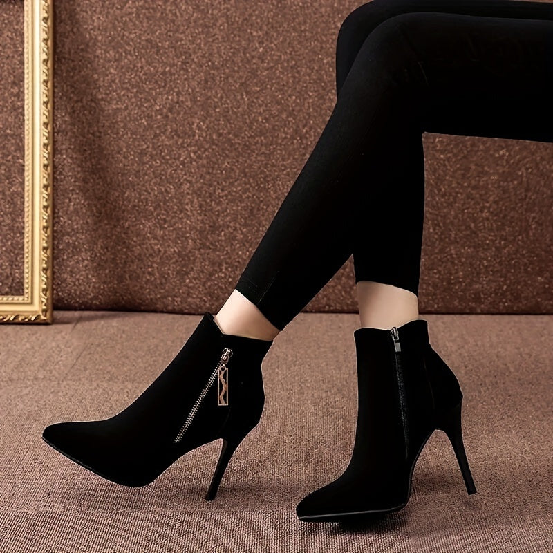 Stylish black high-heel ankle boots with pointed toe and stiletto heel, featuring a flannel upper and side zipper closure. Perfect for parties, weddings, and everyday wear in the fall