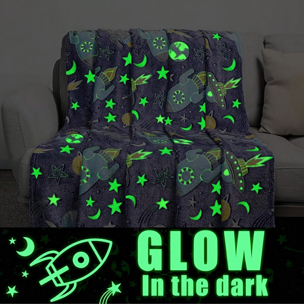 One piece of contemporary style throw blanket featuring glow in the dark space theme. Made of knitted all-season polyester, this bed blanket has active printing with a cartoon rocket and stars pattern. It is soft and can be used as a sofa cover. An ideal