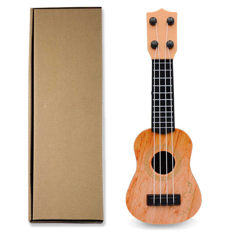 Mini playable uke instrument figurine made of plastic for home and office decor, ideal gift for music enthusiasts.