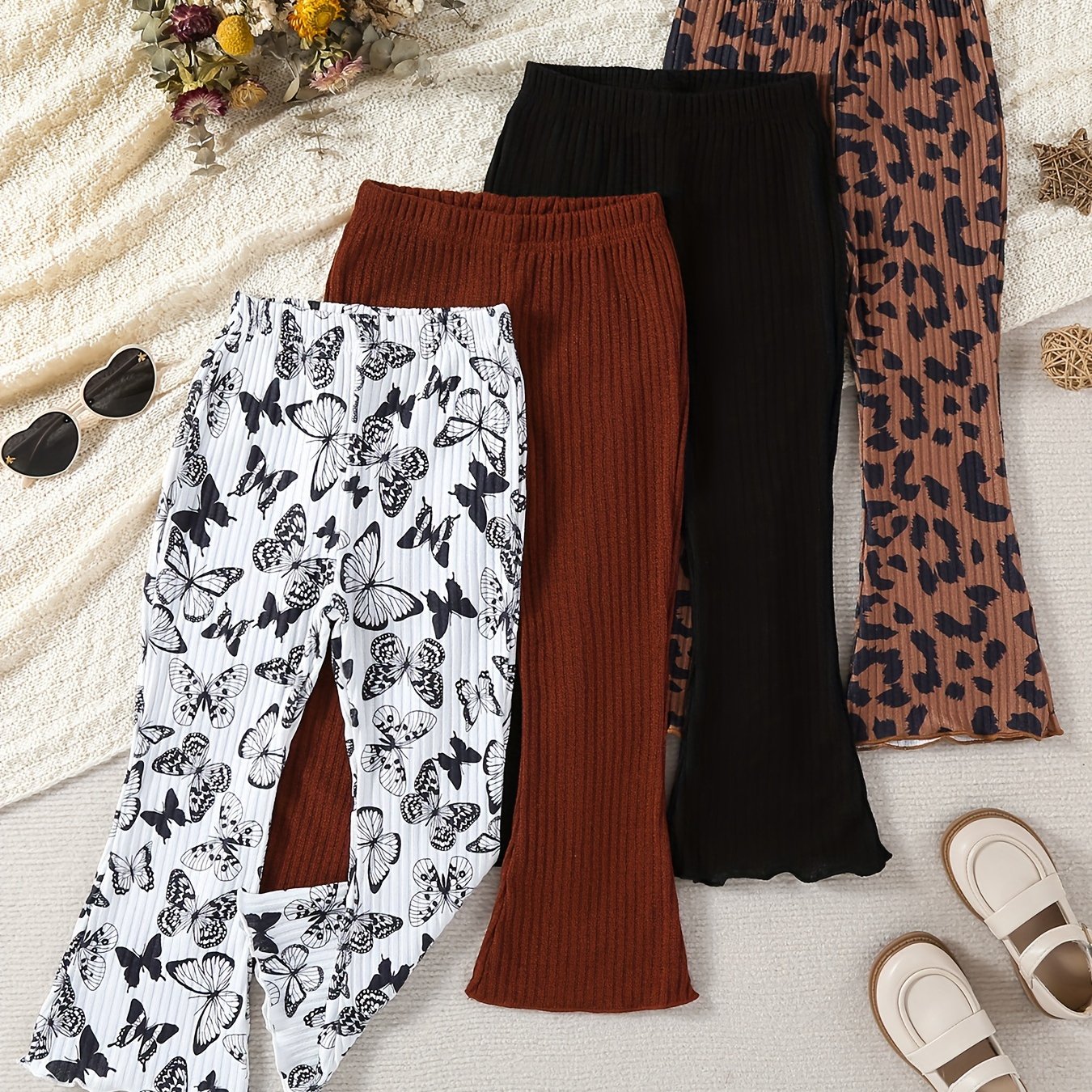 4 stylish girls' casual pants in houndstooth, leopard print, and solid colors. Made of polyester, machine washable. Ideal for spring/fall and outdoor wear.