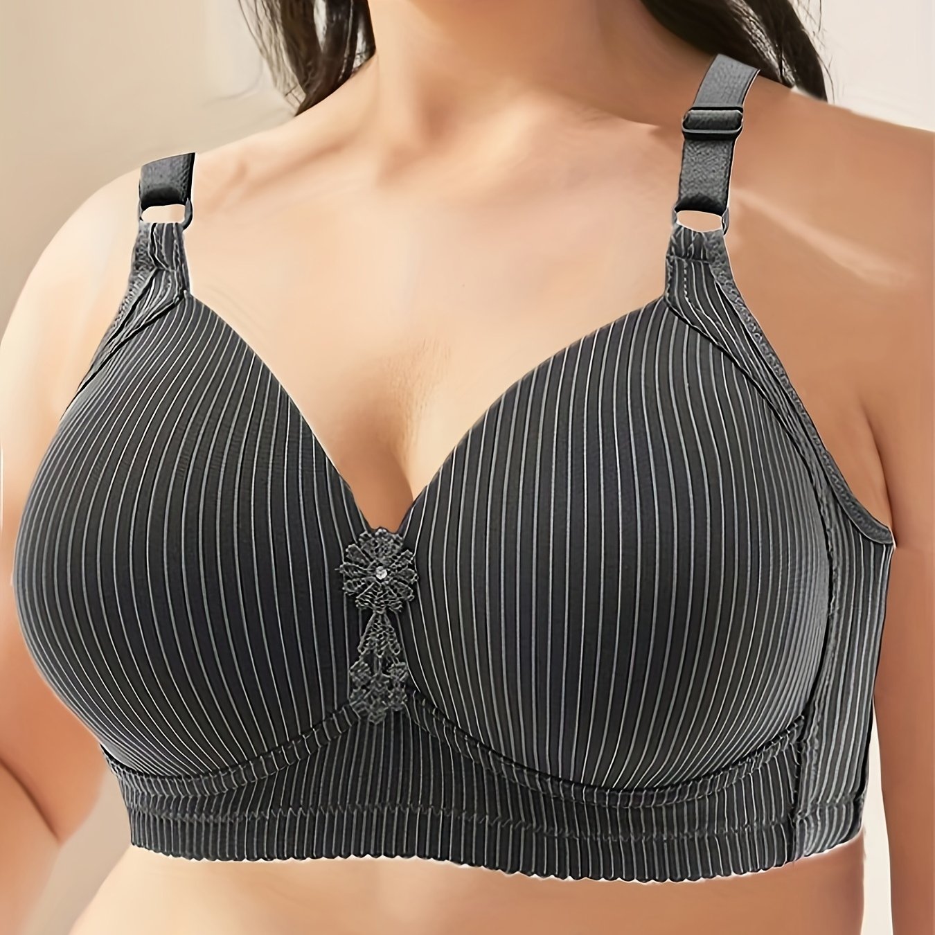 Elegant plus size striped seamless push up bra for women with medium support and non-removable padding. Made of 90% polyester and 10% elastane. Suitable for all seasons.