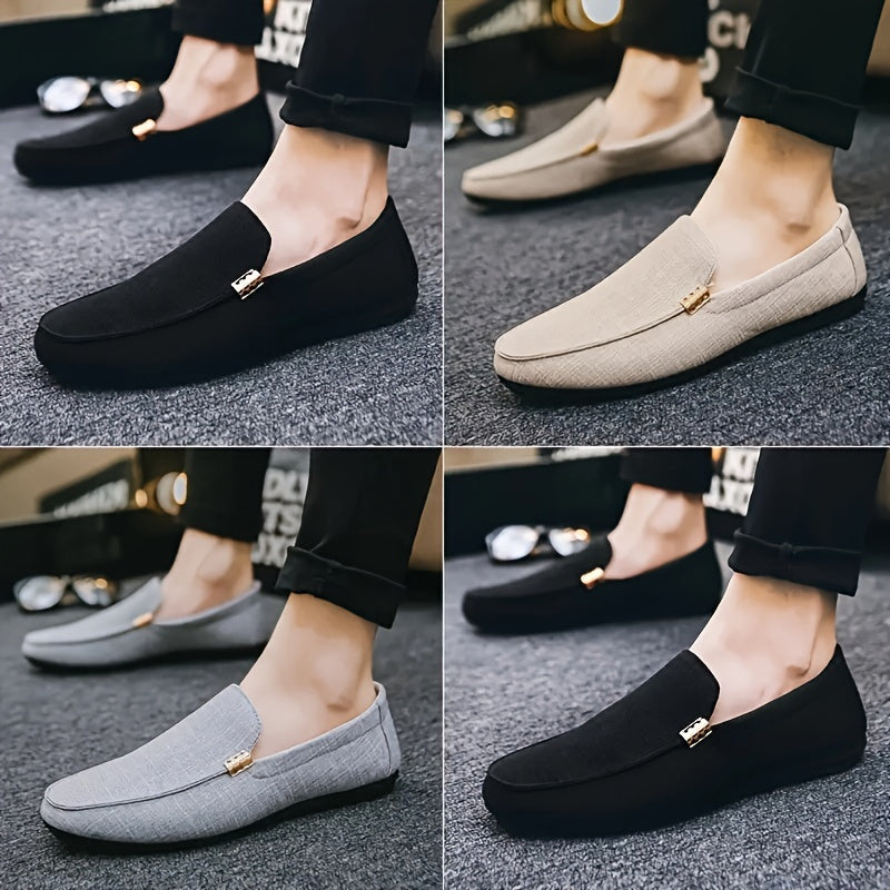 Men's black canvas loafers with metal decor, round toe, comfortable insole, suitable for casual and outdoor wear.