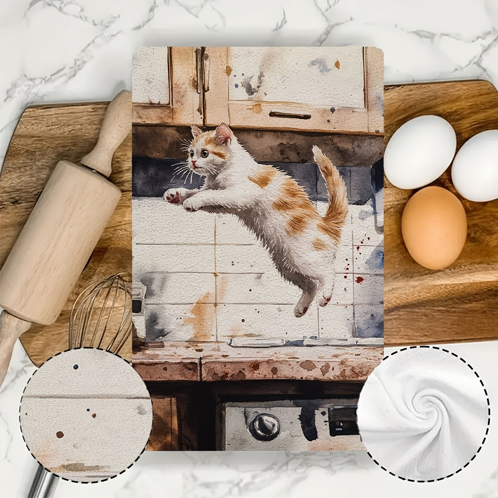 Two pieces of incredibly soft kitchen towels featuring a playful kitten leaping design. These highly absorbent and machine washable dish hand towels are perfect for your contemporary style kitchen. Each towel measures 40.64x60.96 cm and is ideal for