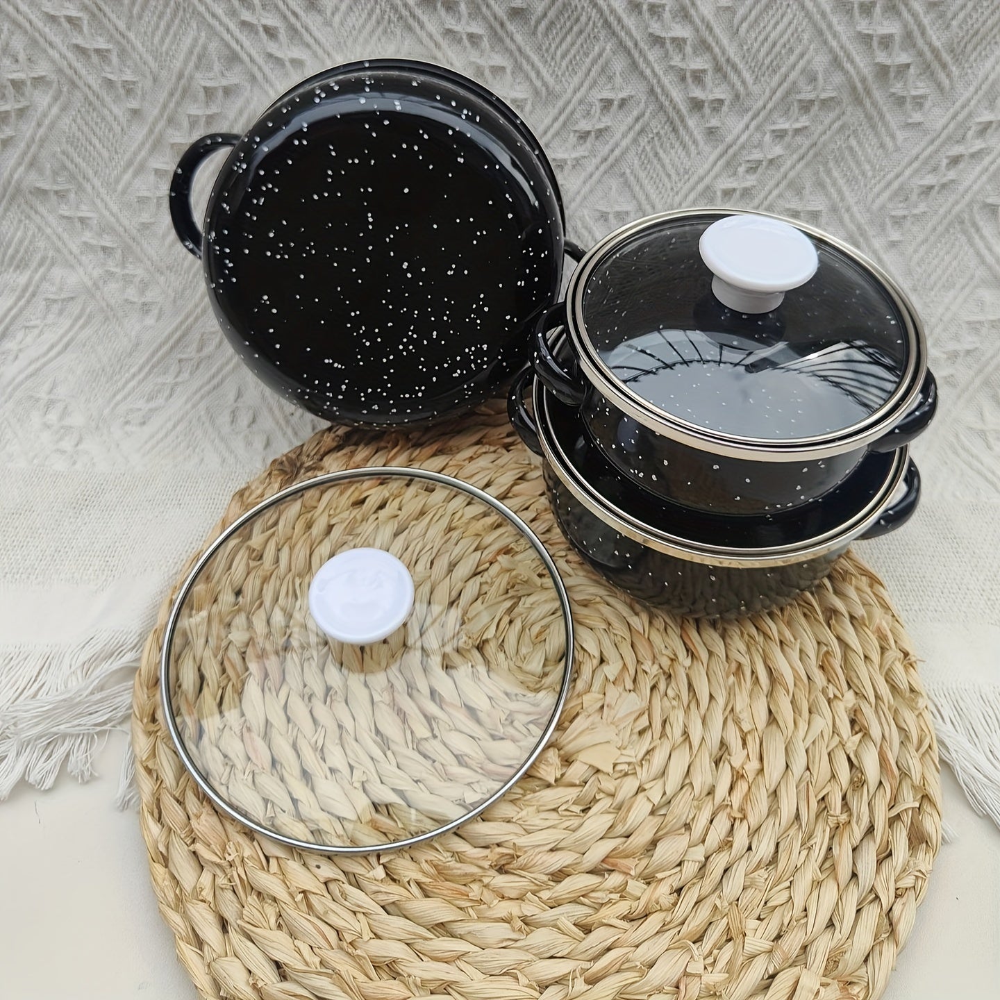 This set includes three mini enamel pots in sizes of 12cm, 14cm, and 16cm, perfect for home use in the kitchen. They are suitable for gas and electric stoves, making them versatile for any cooking needs. This set makes a great holiday gift and is perfect