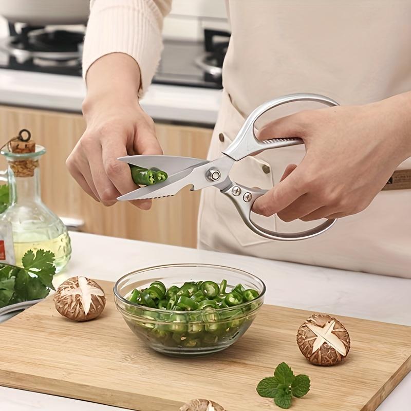 Durable and comfortable, these versatile stainless steel kitchen scissors with an ergonomic handle are perfect for cutting chicken bones, meat, fish, vegetables, and more. The super sharp blades make cooking and dining tasks a breeze.