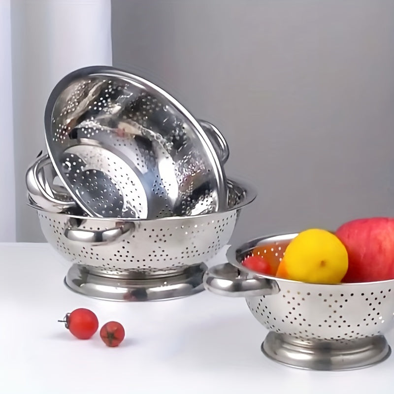 One piece of a durable metal colander with handles, perfect for washing and draining vegetables, fruits, and pasta. This food-safe kitchen strainer is made of stainless steel and comes with a sturdy base.