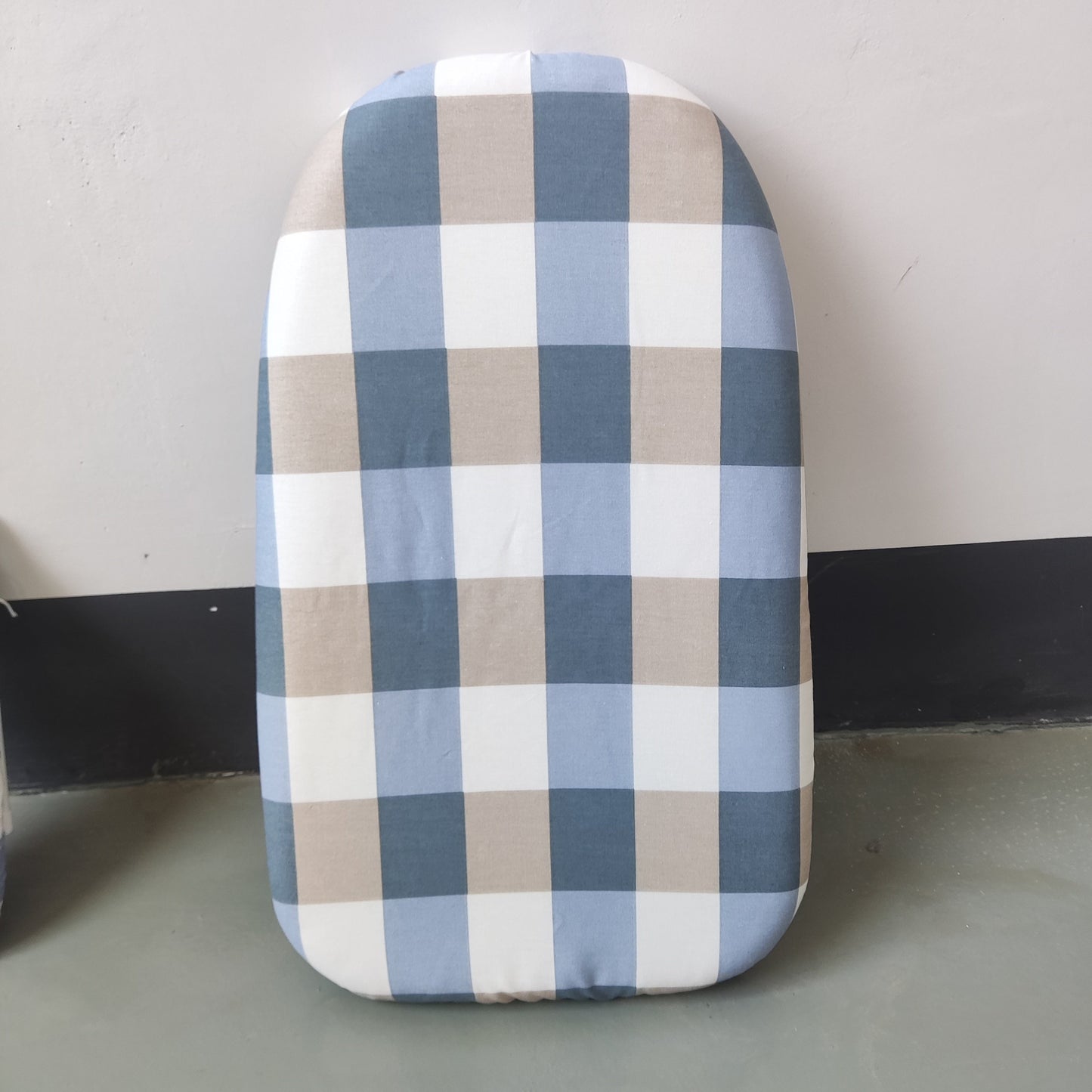 Compact clothes folding board with ironing sleeve, perfect for small spaces and on-the-go use.