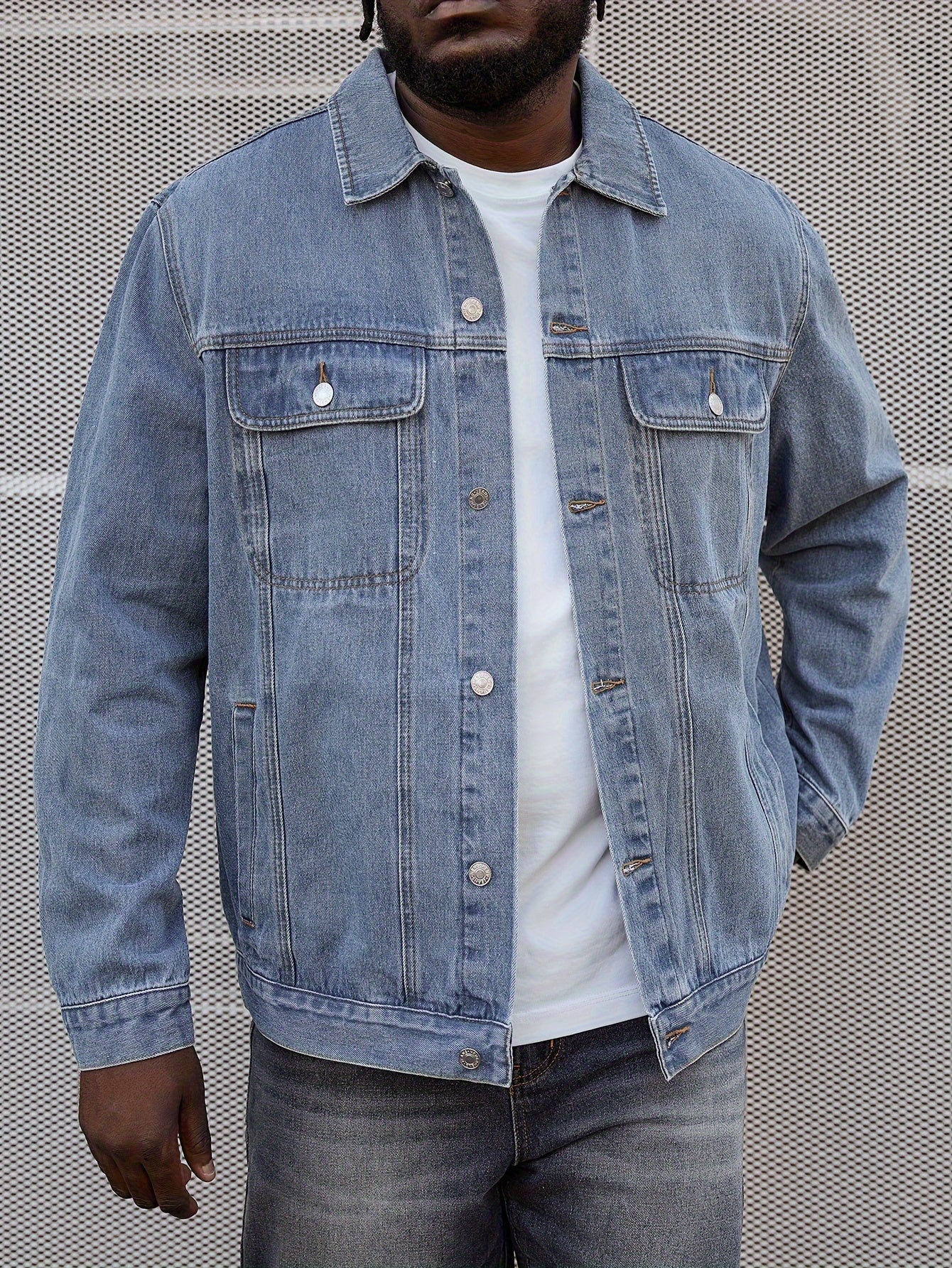 Plus size men's washed denim jacket with classic fit made from cotton fabric.