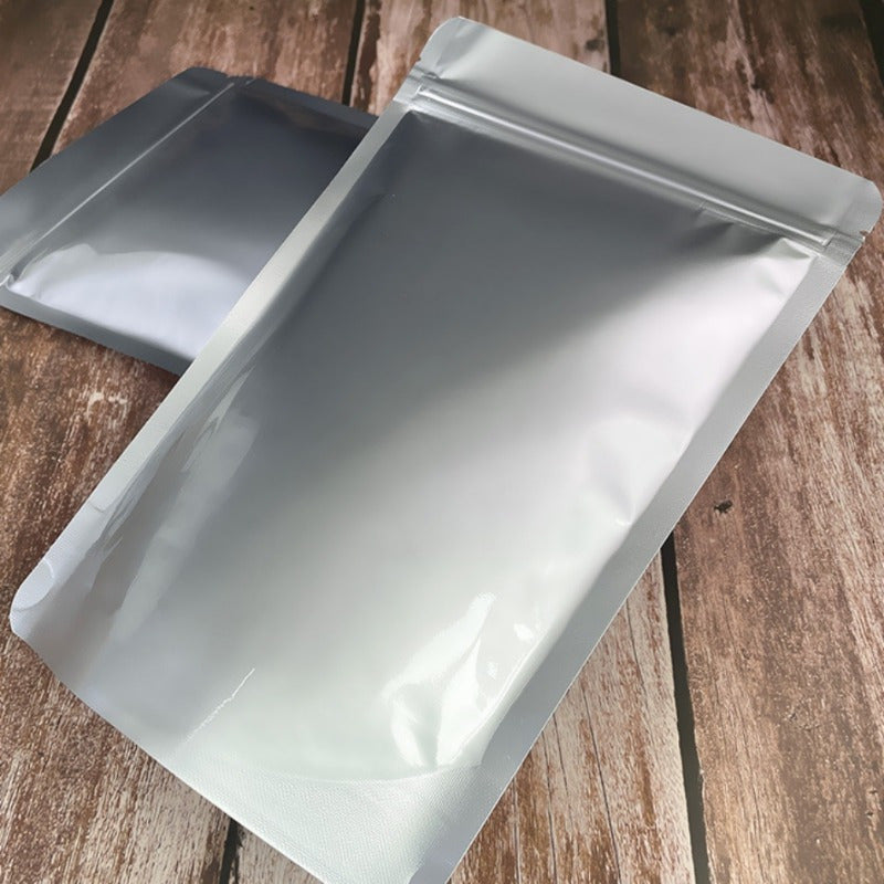 Premium self-sealing aluminum foil bag designed for pet food storage. Features a stand-up ziplock design that is vacuum sealed, waterproof, and moisture-proof. No electricity required for use.